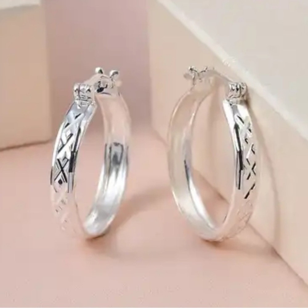 Sterling Silver Diamond Cut Hoop Earrings with Latchback Closure